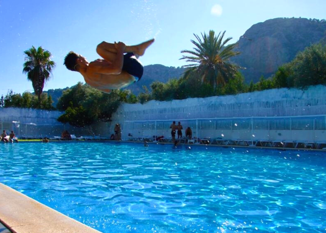 Guests enjoying the pool at the club
